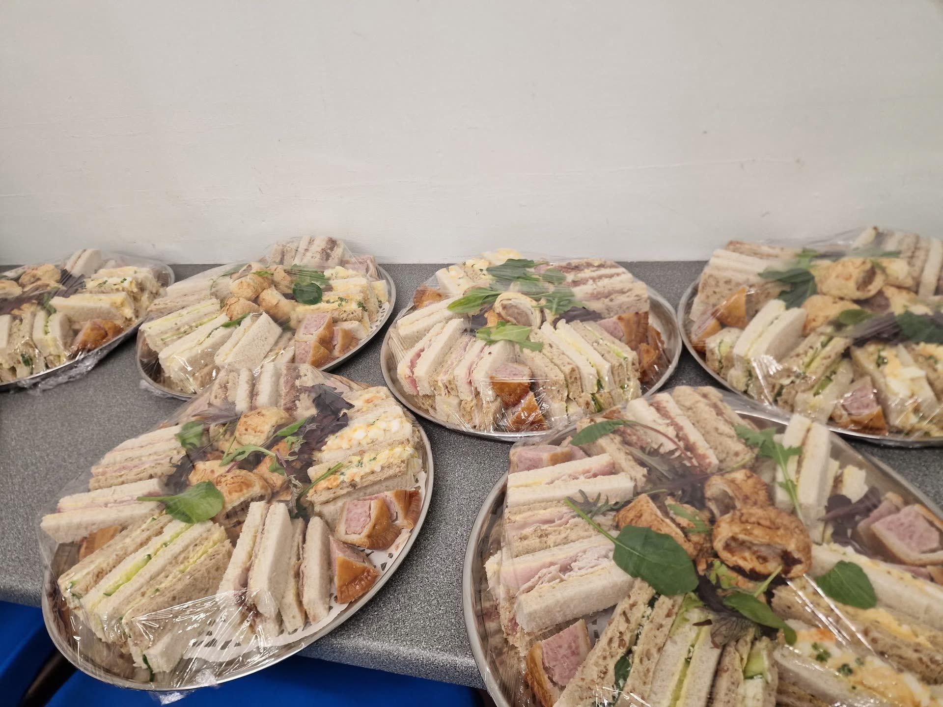 Sandwich platters laid out on a table